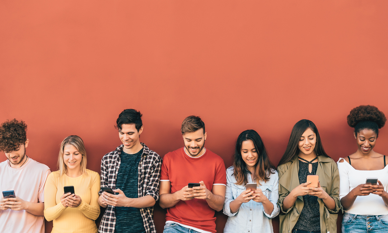 Students looking at smartphones