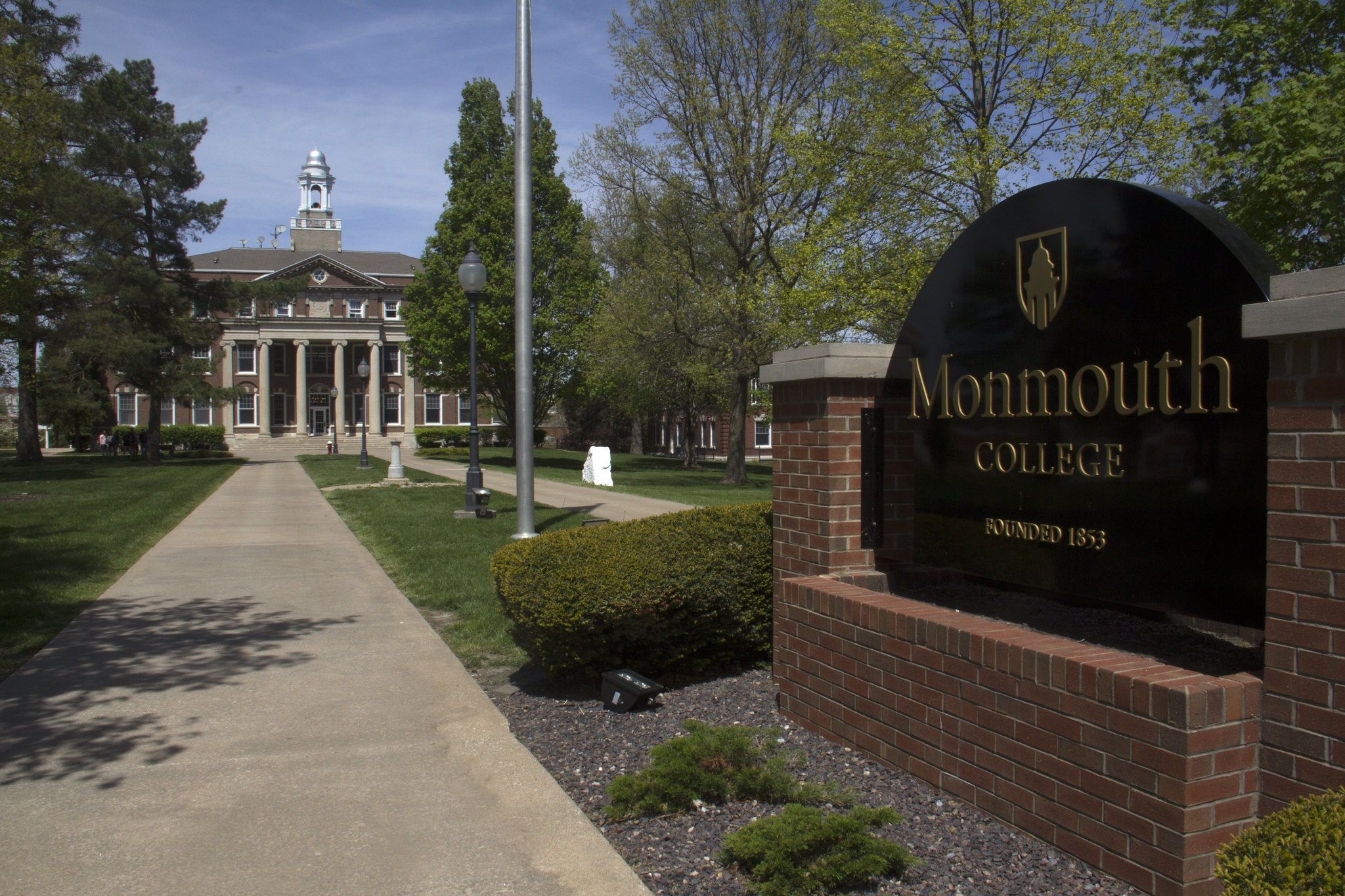 Monmouth College’s campus entrance, with Wallace Hall rising in the background.